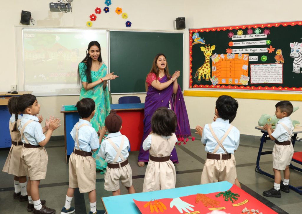 LKG students participating in activity with faculty