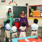 LKG students participating in activity with faculty